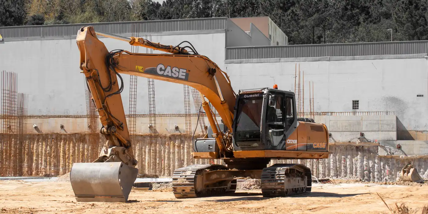 Excavation skid steer working on a job site in Des Moines
